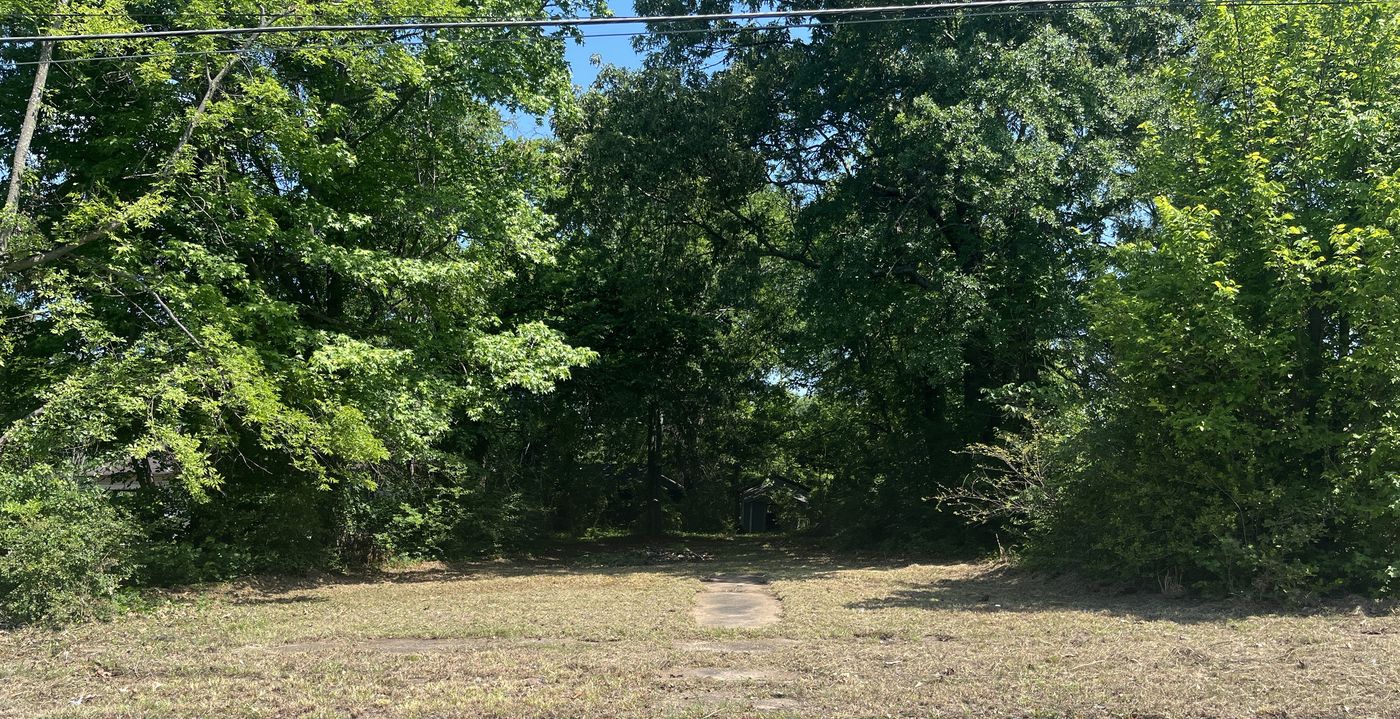 The same lot cleared down to open ground